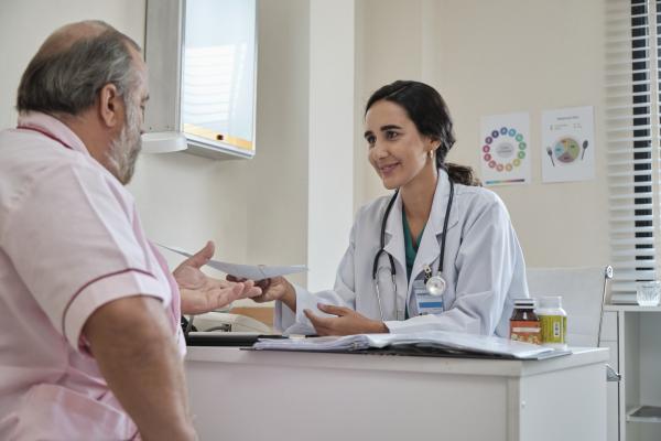 Clinician meets with patient